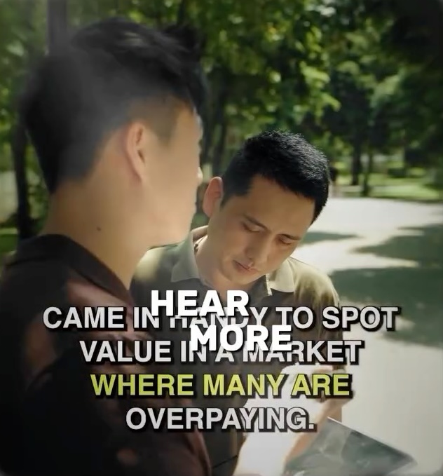 Damien Tan helping a client spot value in the market